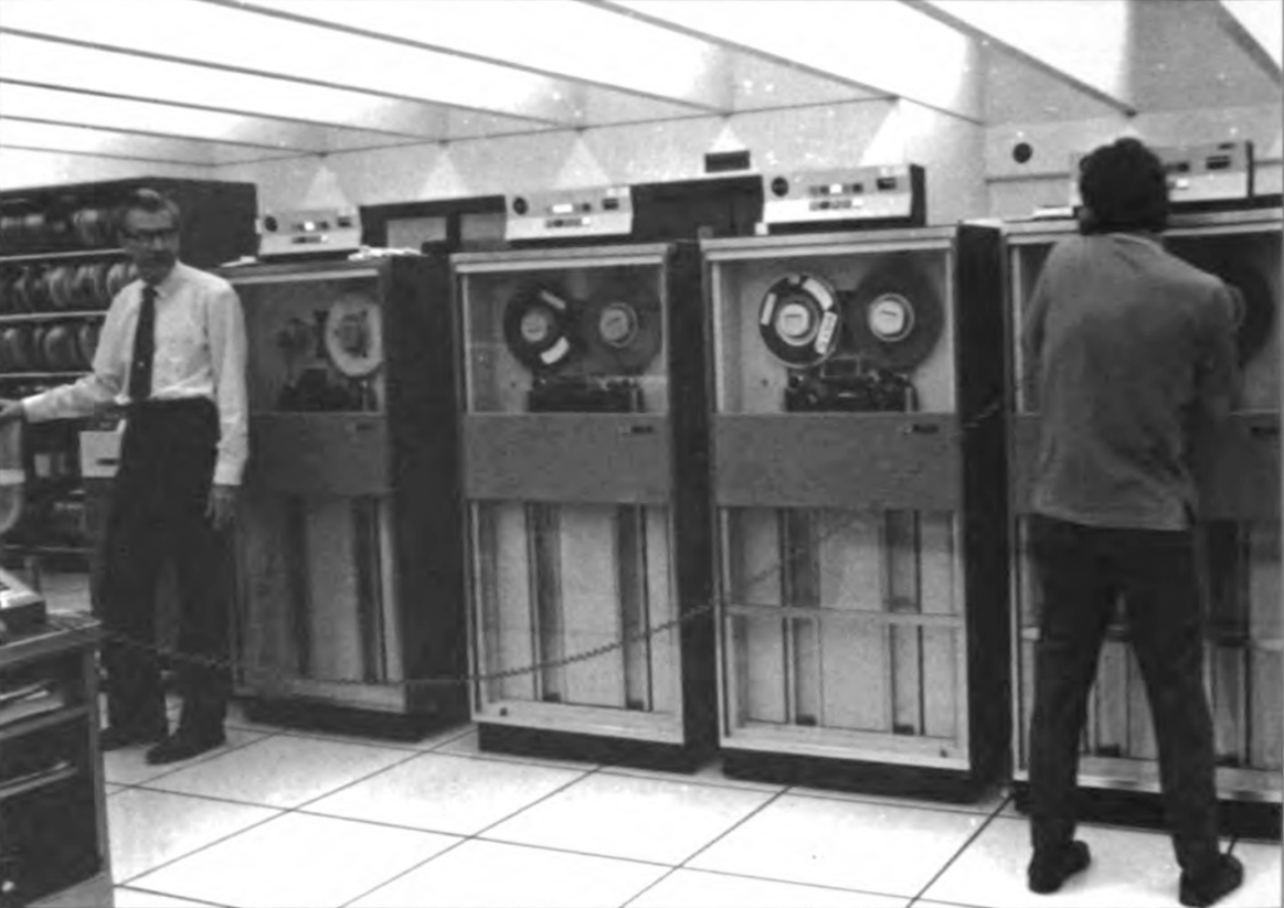 <p><font size="-2">Robert Bartels (left) stands in one of the machine rooms at U-M